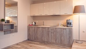 Business Studio Suite, 1 Bedroom, Non Smoking, City View | Private kitchen | Coffee/tea maker, mini-fridge, electric kettle - Cityscape Studios (Plovdiv)
