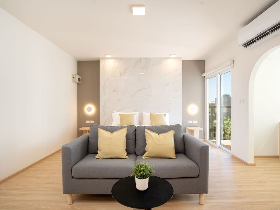 Suite, 1 Bedroom with balcony | Living area | 40-inch Smart TV with digital channels