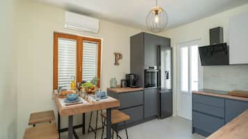 Villa (Three Bedroom Villa with Terrace) | Private kitchen | Fridge
