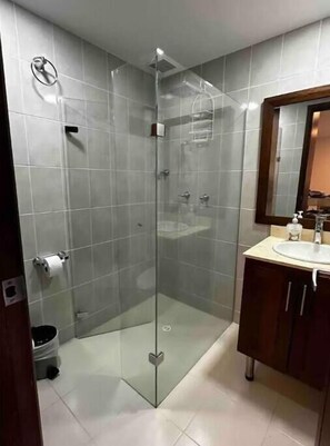 Shower, hair dryer, towels, soap