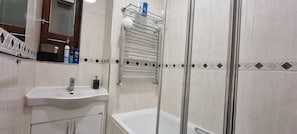 Apartment | Bathroom | Combined shower/tub, deep soaking tub, towels