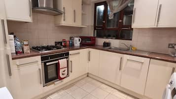 Apartment | Private kitchen | Fridge, microwave, oven, stovetop