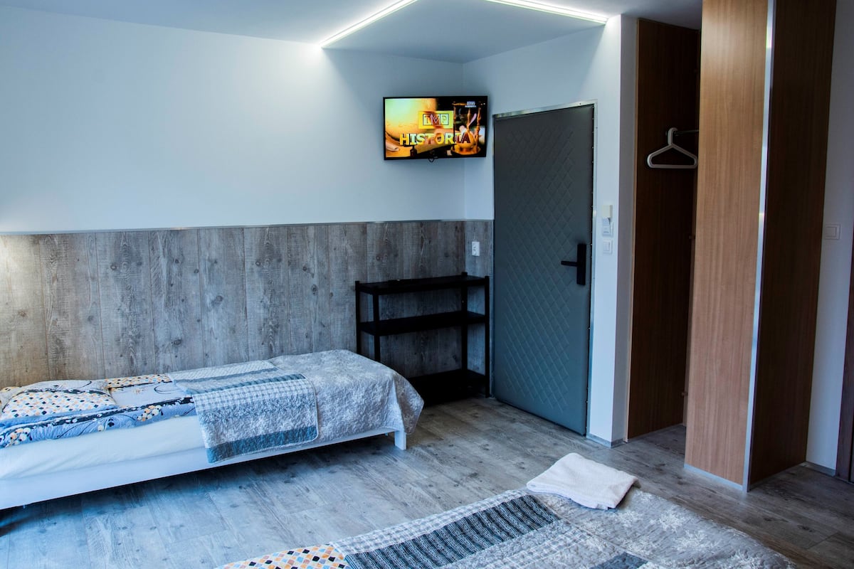 Economy Triple Room | Individually furnished, laptop workspace, blackout drapes