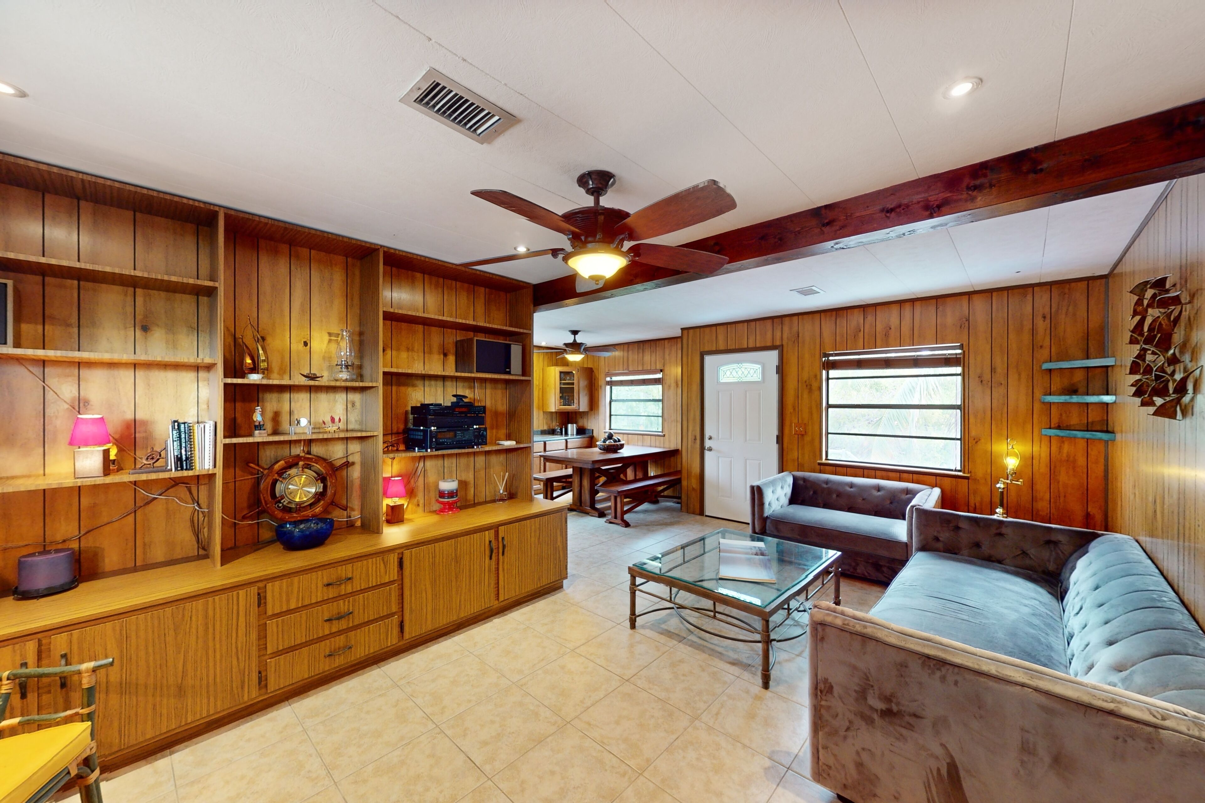 Vintage & nautical oceanfront stay with covered balcony, internet, W/D, & AC