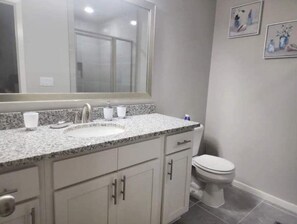 Hair dryer, towels, soap, shampoo