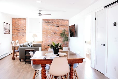 Dining. 1890 Lofts - Harvester: Historic Loft • Near Amana Colonies, Winery, Outlet Mall
