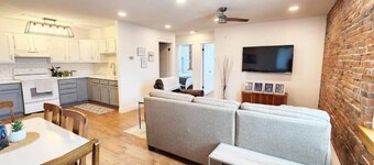 Small-Town Loft: Mayberry- Modern Comfort in 1890 Historical Brick Building