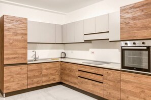 Fridge, oven, stovetop, highchair - A beautiful, brand new 2BR home in St Pauls. (St. Paul`s Bay)