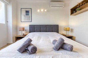 Desk, iron/ironing board, travel crib, WiFi