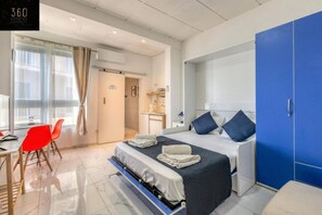 Desk, iron/ironing board, travel crib, WiFi