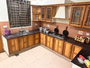 Private kitchen - Cozy Comfort: A Perfect Getaway, E-11/4 Islamabad (Islamabad)