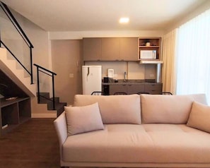 Traditional Apartment | Living area | 43-inch TV with cable channels
