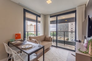 Classic Apartment, Balcony | Living area | 43-inch TV with cable channels