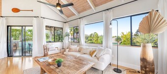 Designer oasis with waterfall & sunset views, hot tub, kayak, surfboard & bikes