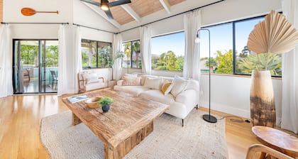 Designer oasis with waterfall & sunset views, hot tub, kayak, surfboard & bikes