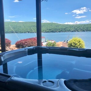 A hot tub with a view of a lake and hills. - The Best Lake House!! World Cup visitors welcome! (Greenwood Lake)