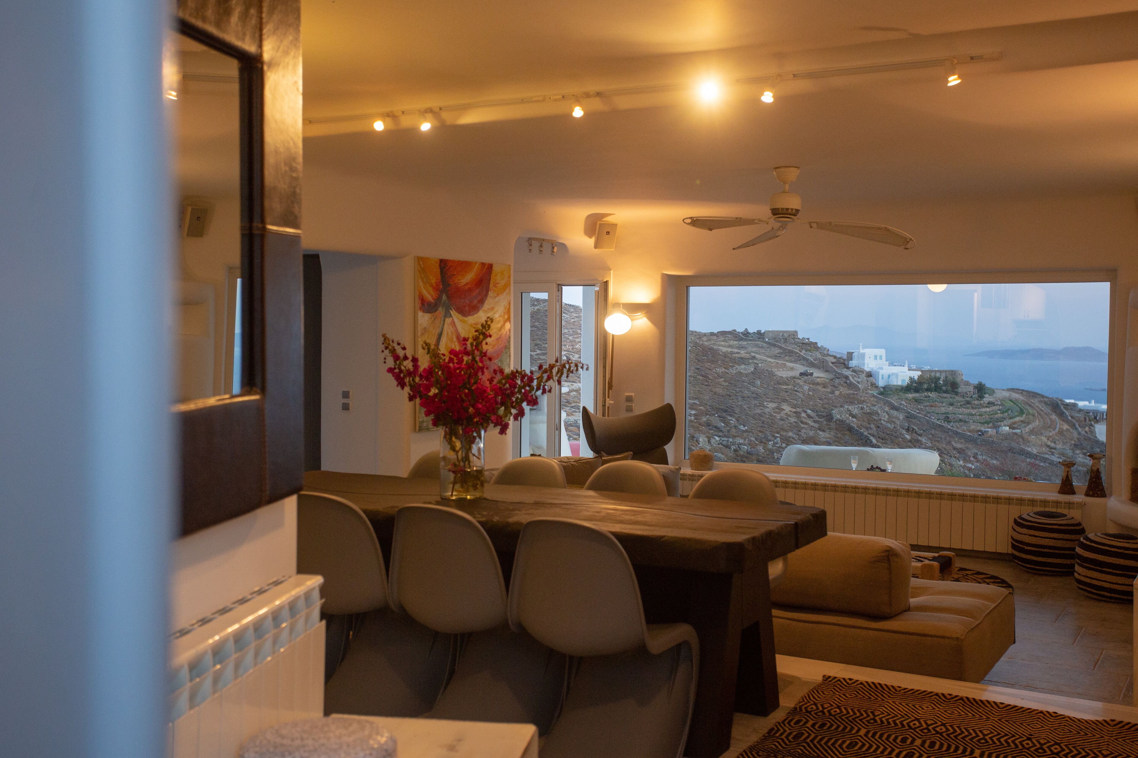 Eleni's Mykonian House | Living area | 75-inch Smart TV with cable channels, books