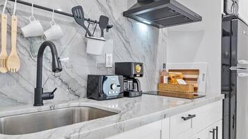 Fridge, microwave, stovetop, coffee/tea maker