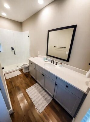 Shower, hair dryer, towels, soap