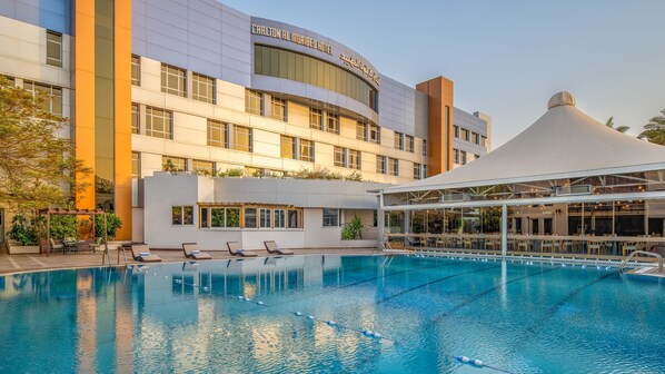 Outdoor pool, open 6:00 AM to 7:00 AM, pool umbrellas, sun loungers