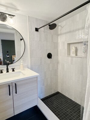 Hair dryer, towels, soap, shampoo