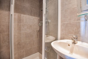 Shower, free toiletries, hair dryer, towels