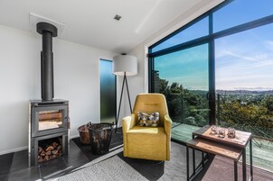 Deluxe-Haus | Wohnbereich | Kamin