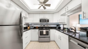 Condo, Multiple Beds (308) | Private kitchen | Full-size fridge, microwave, oven, stovetop - Sea Shell by Beachside Management (Siesta Key)
