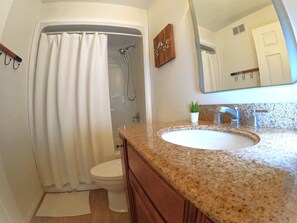 Hair dryer, towels, soap, shampoo