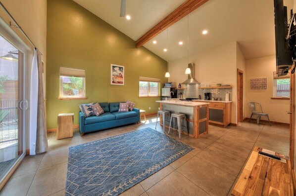 Beautiful open family room and kitchen with high vaulted ceiling