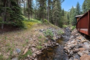 Property grounds - Tranquil Stream Cabin; quaint Estes Park cabin! (Glen Haven)