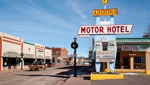 A street view with a motel named "MOTOR HOTEL" and a sign indicating "ARIZONA". - Arizona 9 Motor Hotel  (Williams)