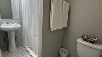 Room, 2 Queen Beds | Bathroom | Separate tub and shower, towels, toilet paper