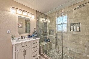 Shower, hair dryer, towels, soap