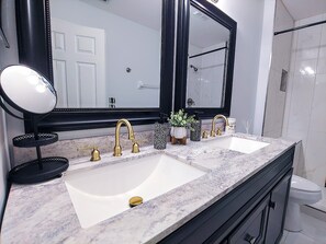 Shower, hair dryer, towels, soap