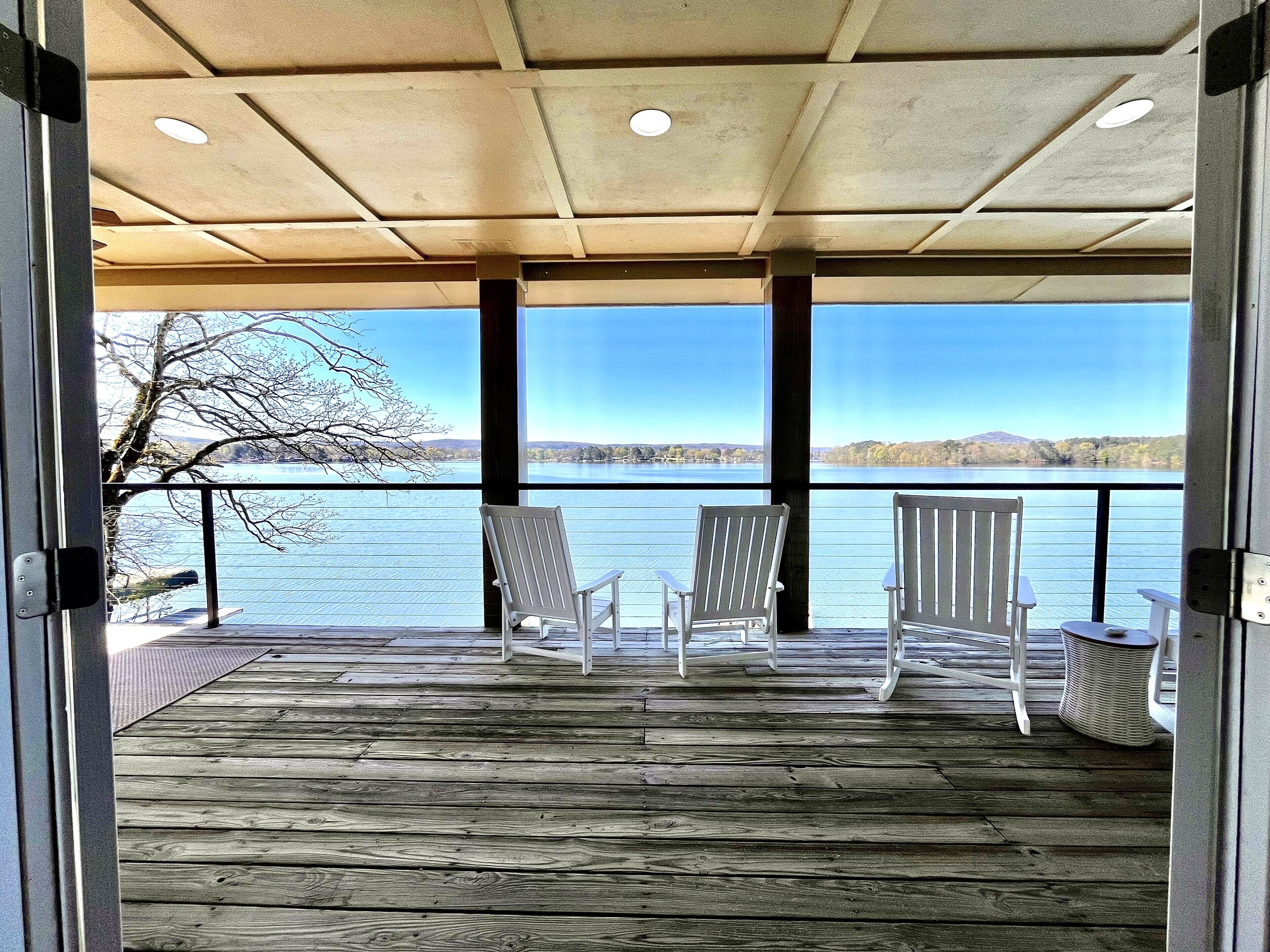 Bunk room view out to 2nd floor deck and lake view.