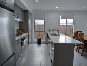 Fridge, microwave, oven, dishwasher - Homey Holiday House (Gregory Hills)