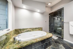 Jetted bath, eco-friendly toiletries, hair dryer, towels