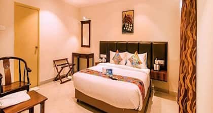 Blossoms Hotel and Service Apartment