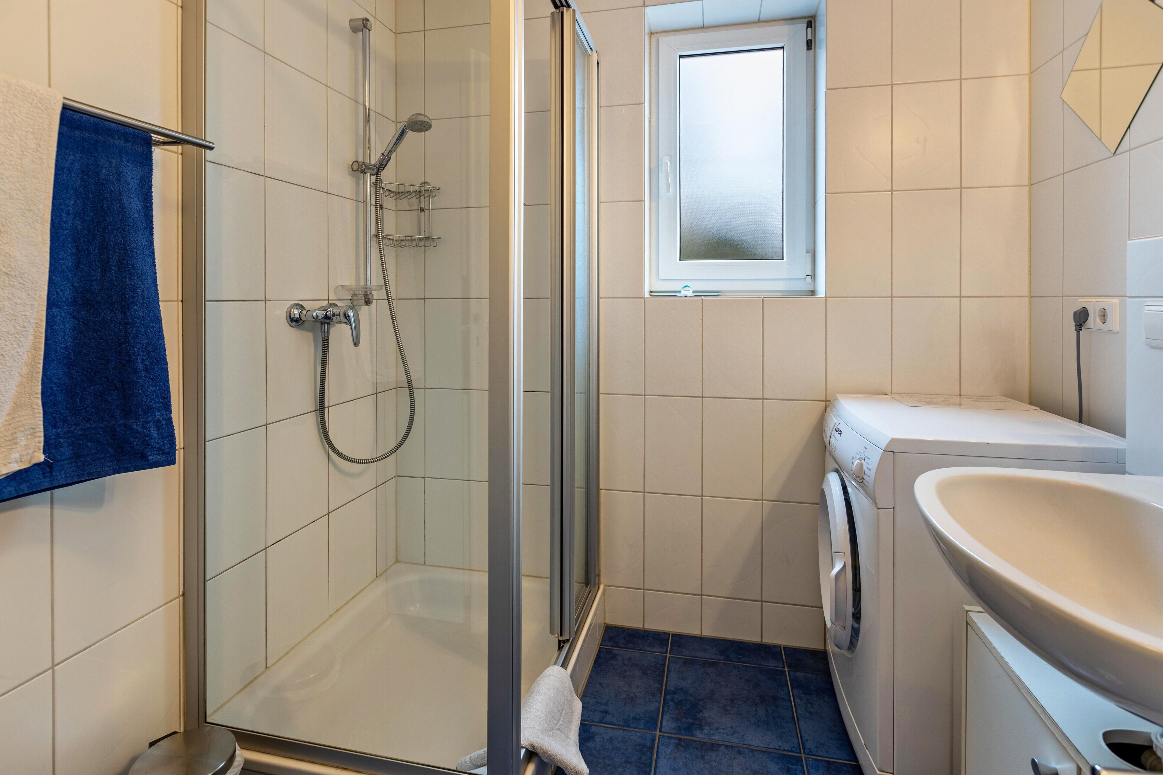 Shower, free toiletries, hair dryer, towels