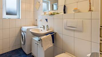 Shower, free toiletries, hair dryer, towels