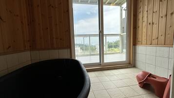 Villa | Bathroom | Separate bathtub and shower, spring water bathtub, bidet, towels