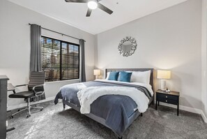 1 bedroom, desk, iron/ironing board, travel crib