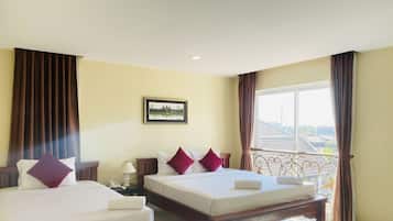Premium bedding, memory-foam beds, desk, laptop workspace