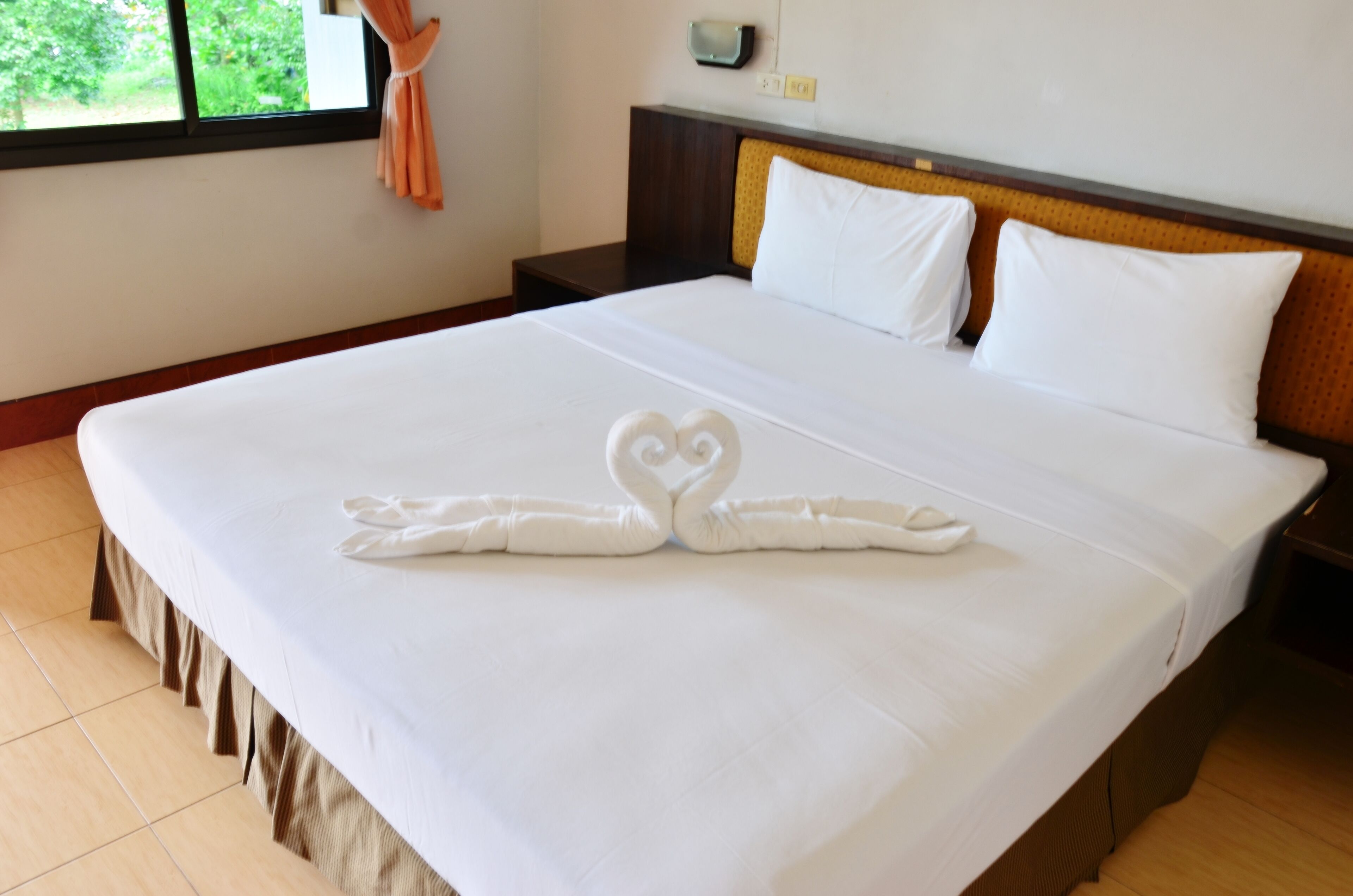 Eenvoudige kamer, 1 slaapkamer, balkon, uitzicht op tuin | 1 slaapkamer, een bureau, gratis wifi, beddengoed