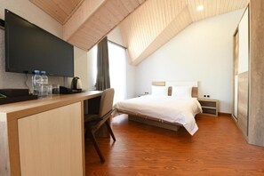 Family Room | Minibar, in-room safe, desk, laptop workspace - Hotel Ereto (Kazbegi)