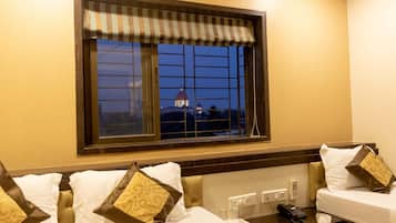 Executive Triple Room, City View | Premium bedding, desk, soundproofing, free WiFi