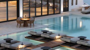 Indoor pool, seasonal outdoor pool, pool umbrellas, sun loungers