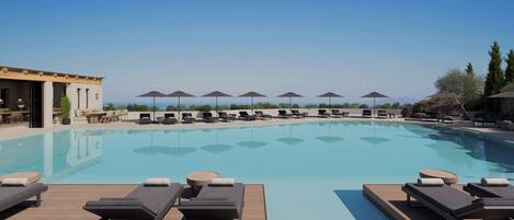 Indoor pool, seasonal outdoor pool, pool umbrellas, sun loungers