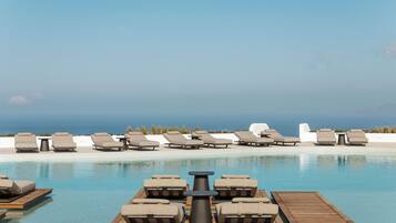 Indoor pool, seasonal outdoor pool, pool umbrellas, sun loungers